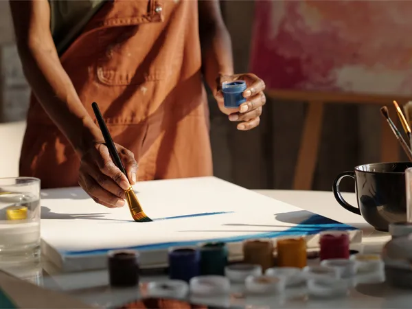 Artist painting on canvas